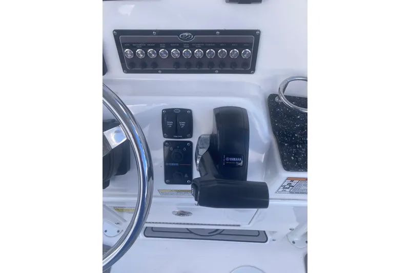 Slide: The Image of Control panel of 2021 Sea Fox 249 Avenger boat with Yamaha throttle and switches. - 21