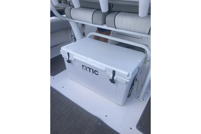 Slide: The Image of RTIC cooler on 2021 Sea Fox 249 Avenger boat deck, under seating. - 28