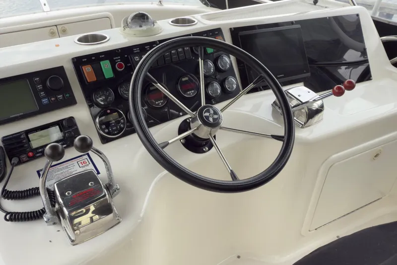 Slide: The Image of Helm of 2001 Riviera Twin Cabin Convertible with steering wheel and control panel. - 20