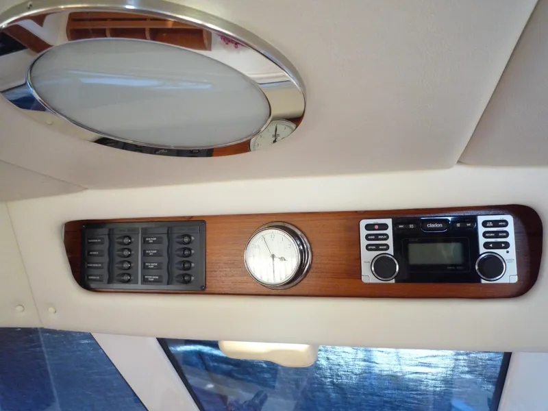 Slide: The Image of Interior of a 2001 Riviera Twin Cabin Convertible with controls and clock. - 7