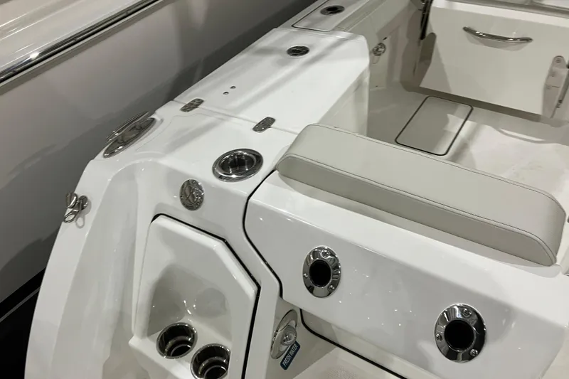 Slide: The Image of 2026 World Cat 265 DC-X boat interior with sleek seating and modern design features. - 13