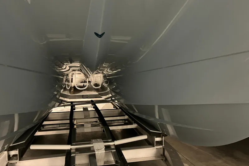 Slide: The Image of Underneath view of 2026 World Cat 265 DC-X boat hull on a trailer. - 9