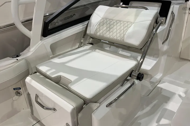 Slide: The Image of Luxurious seating on 2026 World Cat 265 DC-X boat, featuring elegant white upholstery and modern design. - 22
