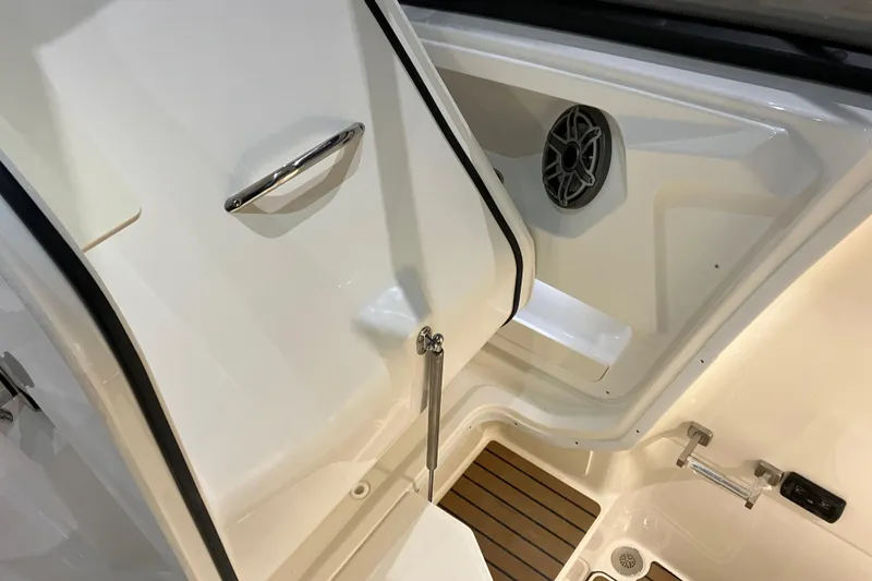 Slide: The Image of Interior of 2026 World Cat 265 DC-X boat, featuring sleek design and modern amenities. - 29