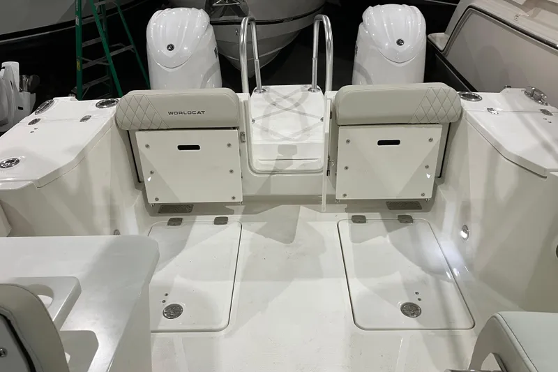Slide: The Image of 2026 World Cat 265 DC-X boat interior with dual engines and seating. - 17