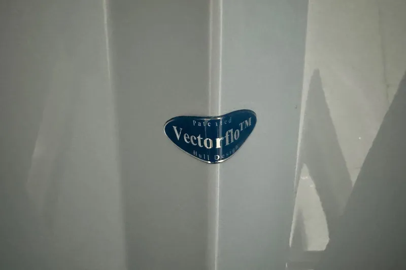 Slide: The Image of World Cat 265 DC-X 2026 boat with Vectorflo hull design badge. - 40