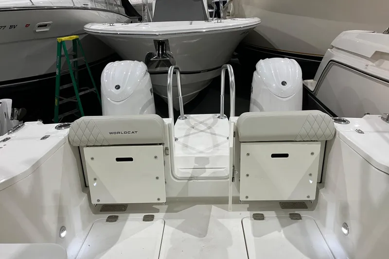 Slide: The Image of 2026 World Cat 265 DC-X boat interior with dual engines and seating. - 21