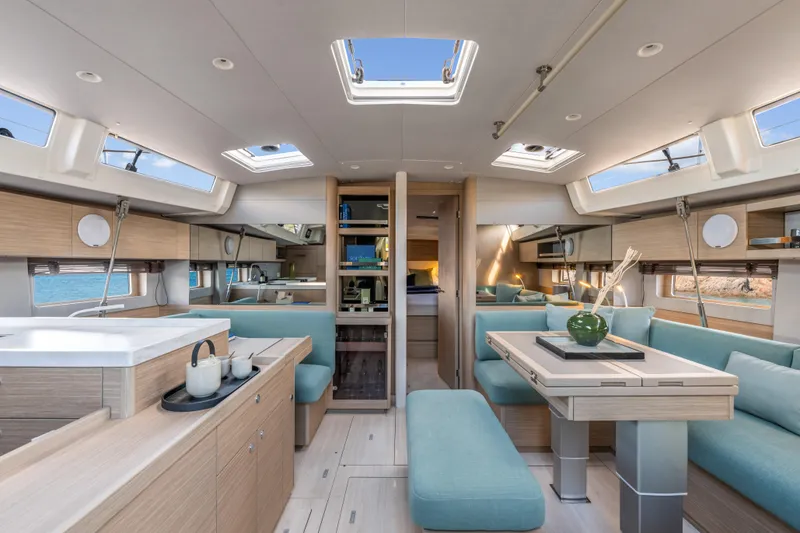 Slide: The Image of Luxurious interior of 2026 Beneteau Oceanis 52 yacht with modern furnishings and ample natural light. - 4