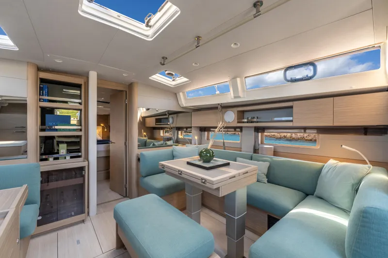Slide: The Image of Luxurious interior of 2026 Beneteau Oceanis 52 yacht with modern furnishings and ample natural light. - 6