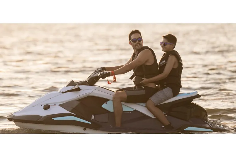 Slide: The Image of 2025 Yamaha WaveRunner JetBlaster LTD displayed in a showroom, highlighting sleek design and features. - 2