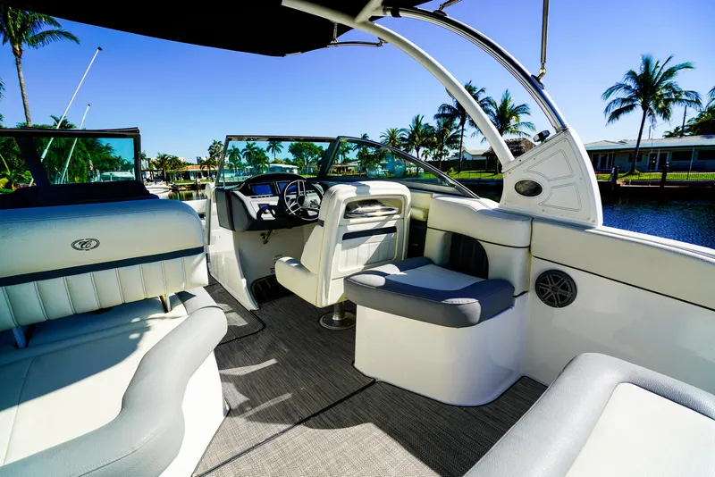 Slide: The Image of 2019 Cobalt 23SC boat interior with luxurious seating and modern design. - 6