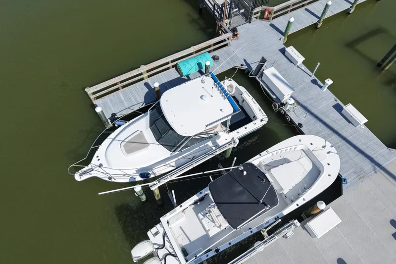 Slide: The Image of Aerial view of 2006 Tiara Yachts 2900 Open Classic docked at marina. - 2