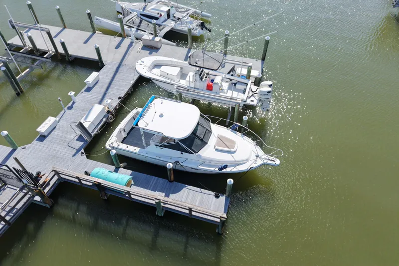 Slide: The Image of 2006 Tiara Yachts 2900 Open Classic docked at marina, aerial view. - 24