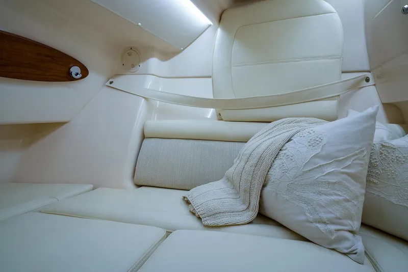 Slide: The Image of Manufacturer Provided Image: 2020 Grady-White Freedom 325 cabin interior with cozy seating and pillows. - 14