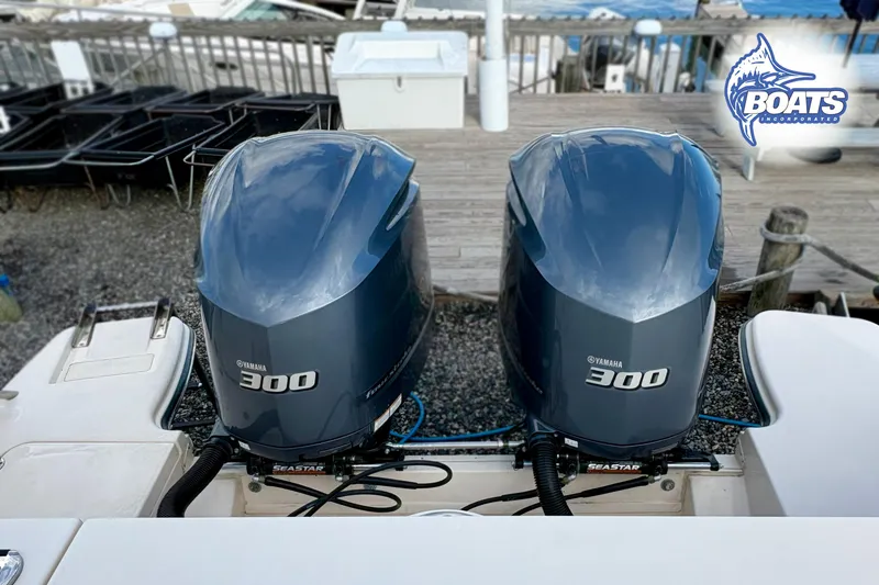 Slide: The Image of Twin Yamaha 300 outboard engines on a 2021 Grady-White Freedom 325 boat. - 19
