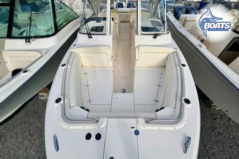 Slide: The Image of 2021 Grady-White Freedom 325 boat interior, showcasing spacious seating and sleek design. - 4