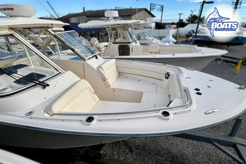 Slide: The Image of 2021 Grady-White Freedom 325 boat with spacious seating and sleek design. - 5