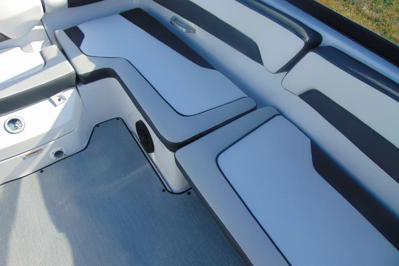 Slide: The Image of 2026 Yamaha Boats AR195 interior seating with sleek, modern design and comfortable upholstery. - 12
