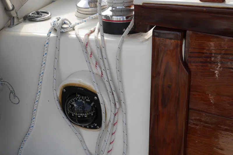 Slide: The Image of 1976 Westsail 32 sailboat deck with rigging and electrical connections. - 23