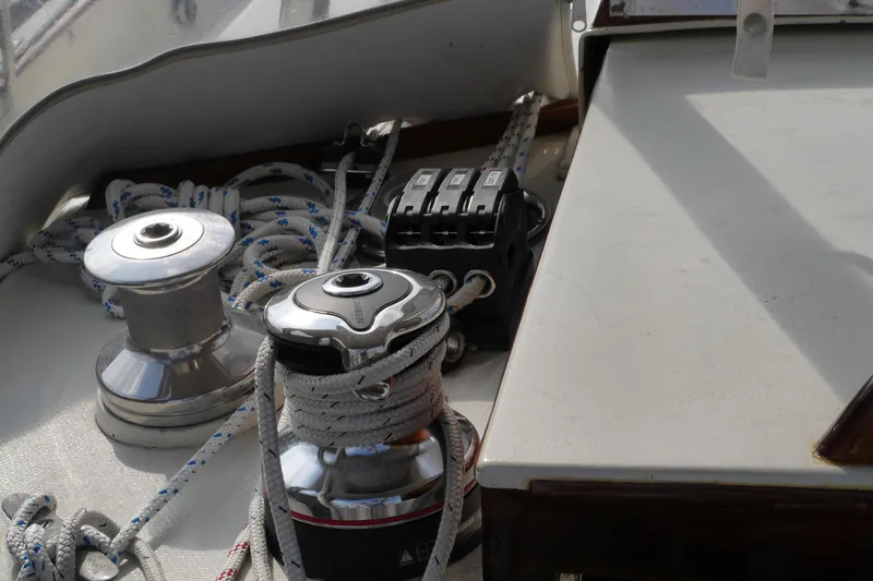 Slide: The Image of Close-up of a 1976 Westsail 32 sailboat boom with Selden branding and rigging details. - 24