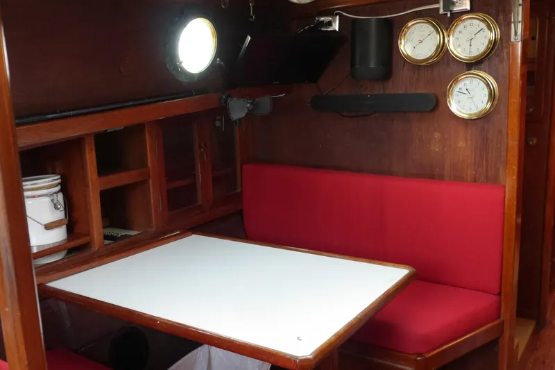 Slide: The Image of Electrical control panel on a 1976 Westsail 32 sailboat with gauges and switches. - 36