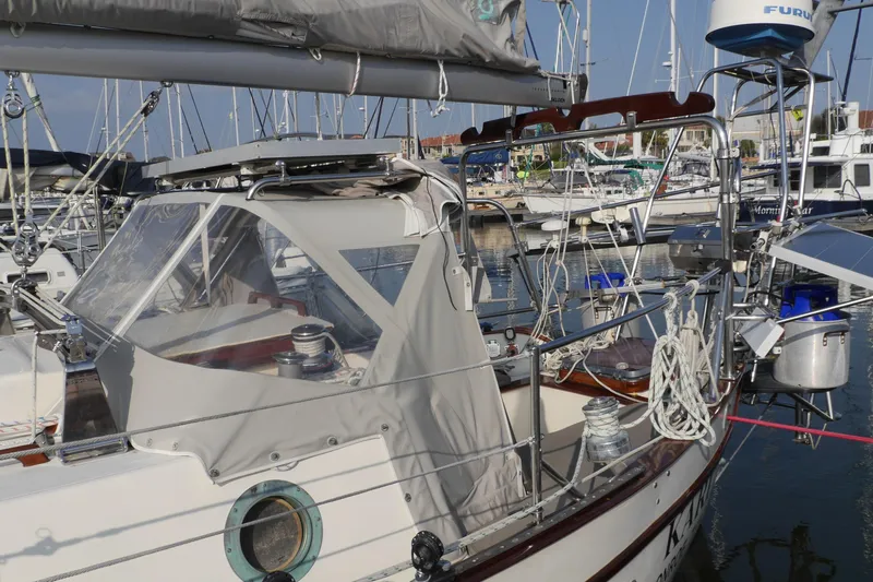 Slide: The Image of 1976 Westsail 32 sailboat mast and rigging against a clear blue sky. - 6