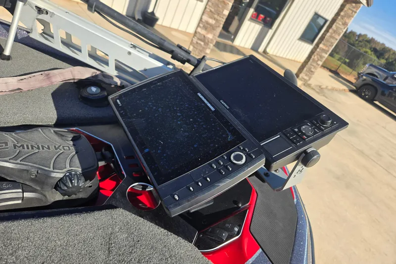 Slide: The Image of 2022 Skeeter FXR20 Apex boat with advanced Garmin fishfinder and Minn Kota trolling motor. - 6