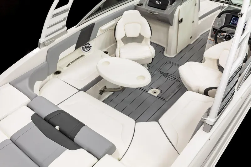 Slide: The Image of Manufacturer Provided Image: 2025 Chaparral 23 SSi boat interior with white seating and sleek design. - 5