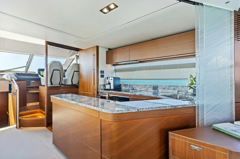 Slide: The Image of Luxurious interior of 2018 Princess Y75 yacht with modern kitchen and helm station. - 19