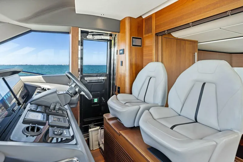 Slide: The Image of Luxurious interior of 2018 Princess Y75 yacht with modern helm and seating. - 2