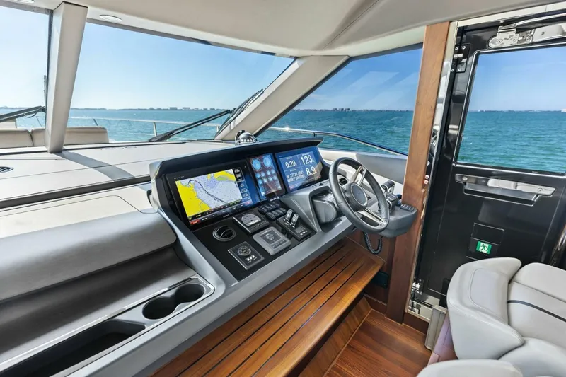 Slide: The Image of Luxurious 2018 Princess Y75 yacht cockpit with advanced navigation system and ocean view. - 21
