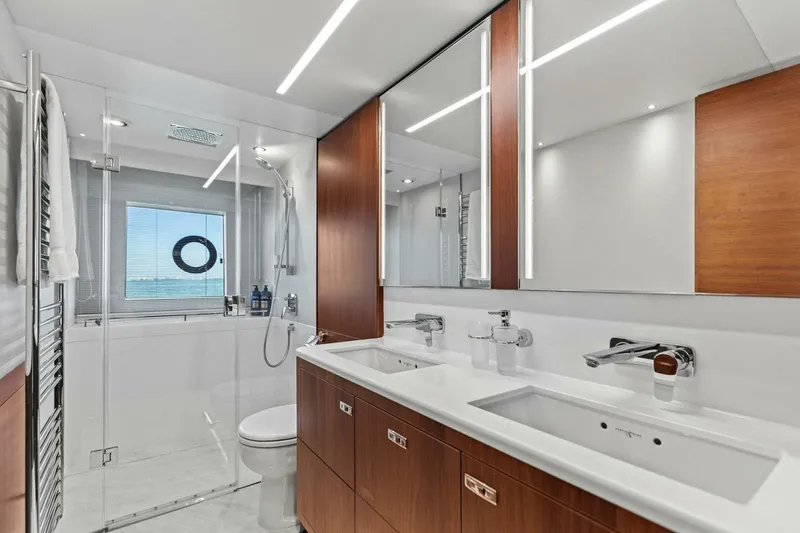 Slide: The Image of Luxurious bathroom on 2018 Princess Y75 yacht with dual sinks and modern shower. - 29