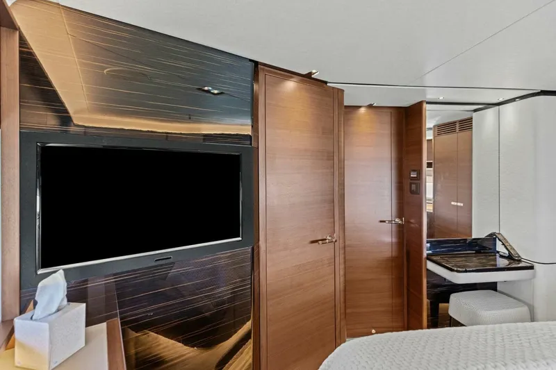 Slide: The Image of Luxurious interior of 2018 Princess Y75 yacht with sleek wood paneling and modern amenities. - 34