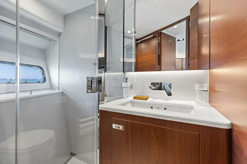 Slide: The Image of Luxurious bathroom in 2018 Princess Y75 yacht with modern fixtures and wooden cabinetry. - 37