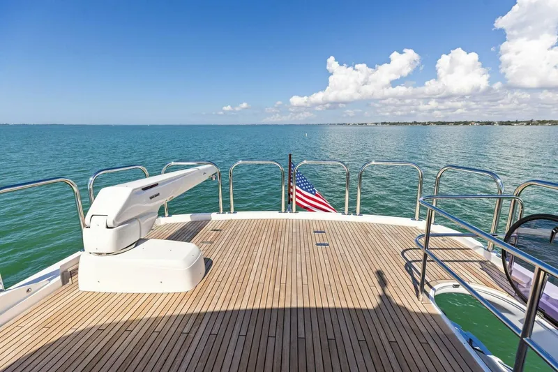 Slide: The Image of Deck of 2018 Princess Y75 yacht with ocean view and American flag. - 52