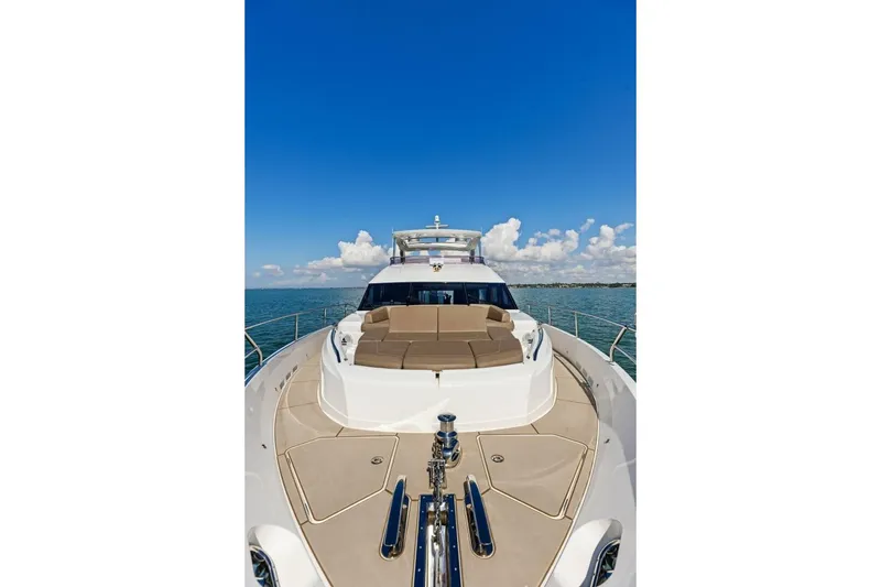 Slide: The Image of Luxurious 2018 Princess Y75 yacht on open sea under clear blue sky. - 56