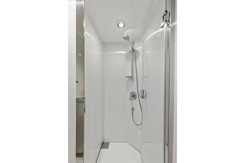 Slide: The Image of Modern shower in 2018 Princess Y75 yacht, featuring sleek white design and chrome fixtures. - 67