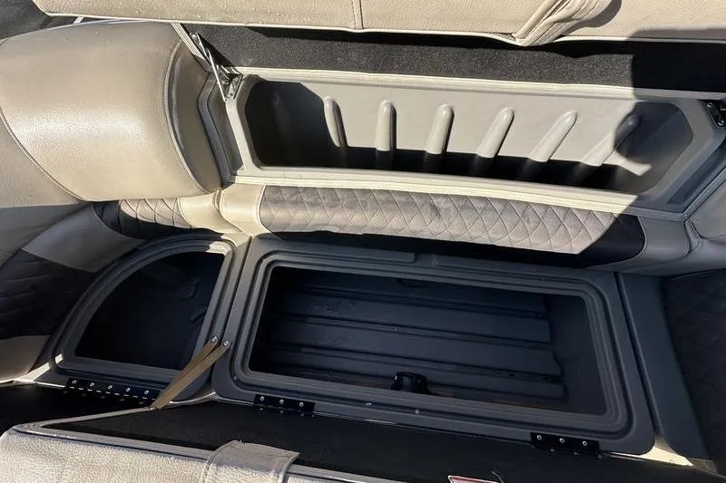 Slide: The Image of Open storage compartment in 2023 Sun Tracker Party Barge 20 DLX pontoon boat. - 12