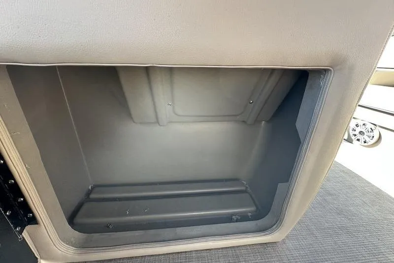 Slide: The Image of Storage compartment in 2023 Sun Tracker Party Barge 20 DLX pontoon boat. - 13