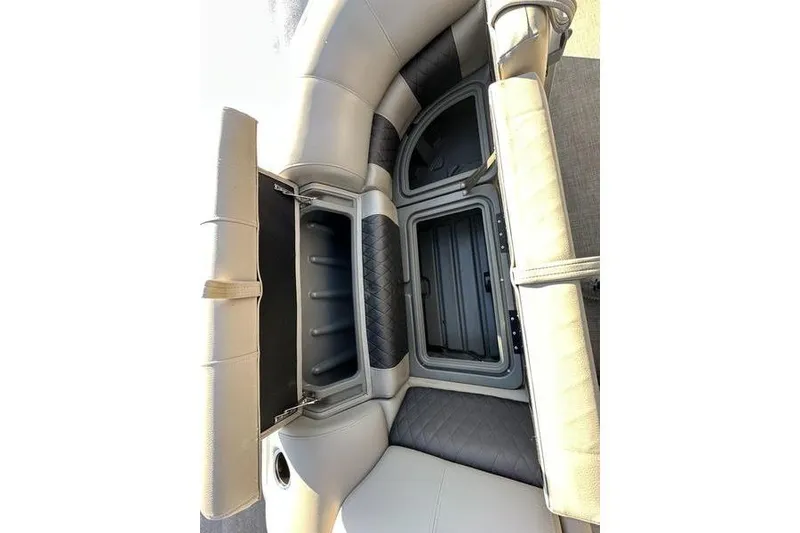 Slide: The Image of 2023 Sun Tracker Party Barge 20 DLX interior storage compartments. - 18