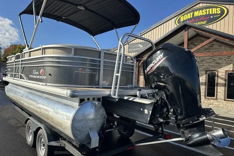 Slide: The Image of 2023 Sun Tracker Party Barge 20 DLX pontoon boat with Mercury engine at dealership. - 8