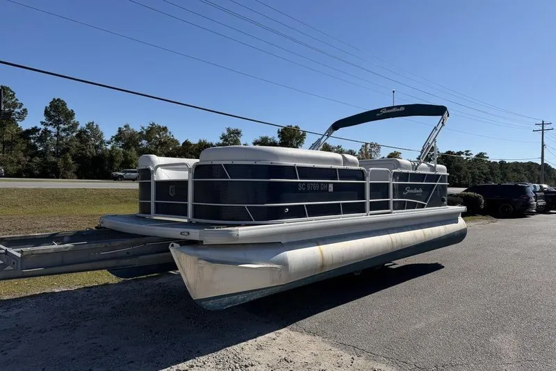 Slide: The Image of 2018 Godfrey SWEETWATER 2286 SB pontoon boat parked on a trailer. - 3