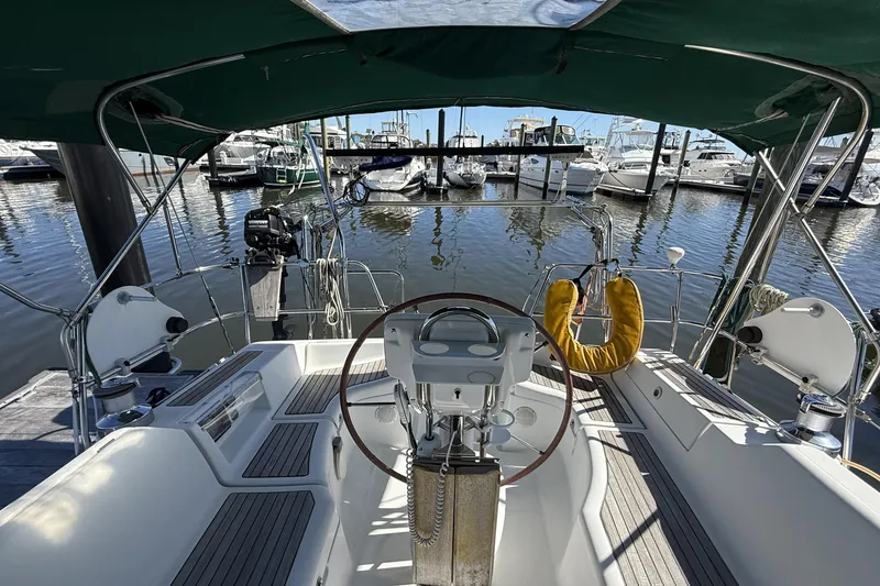 Slide: The Image of Cockpit view of 2005 Beneteau Oceanis 373 sailboat docked at marina. - 18