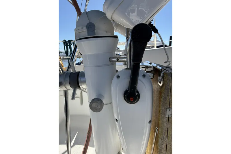 Slide: The Image of Close-up of 2005 Beneteau Oceanis 373 sailboat helm and throttle controls. - 31