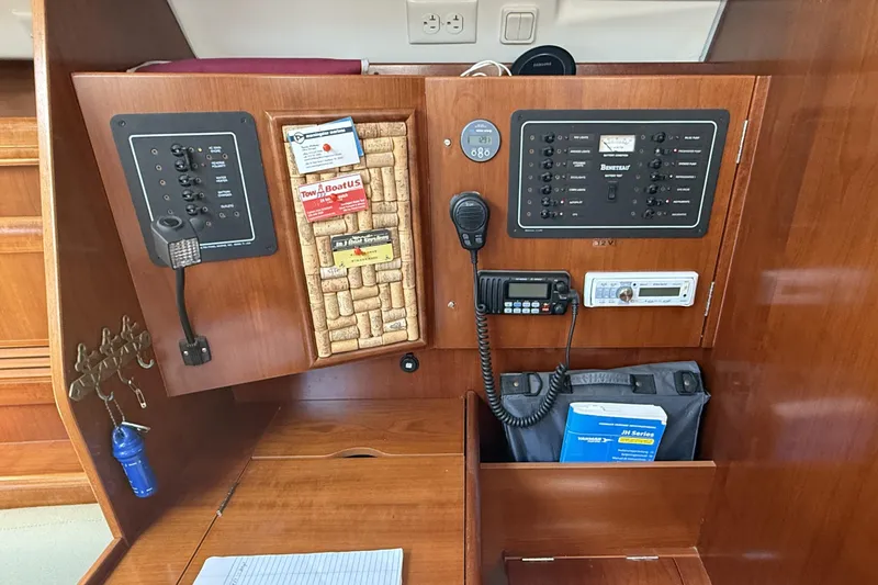 Slide: The Image of Control panel of a 2005 Beneteau Oceanis 373 sailboat with navigation equipment. - 34