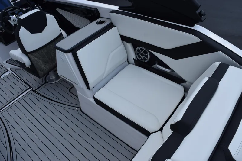 Slide: The Image of 2026 Yamaha Boats 252S interior with sleek white seating and modern design. - 11