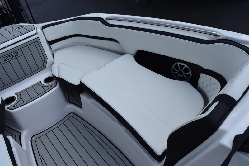 Slide: The Image of 2026 Yamaha Boats 252S interior with sleek white seating and modern design. - 17