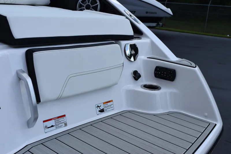 Slide: The Image of 2026 Yamaha Boats 252S swim platform with seating, speaker, and control panel. - 7