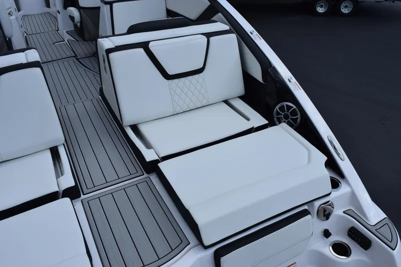 Slide: The Image of 2026 Yamaha Boats 252S interior with white seating and sleek design. - 9