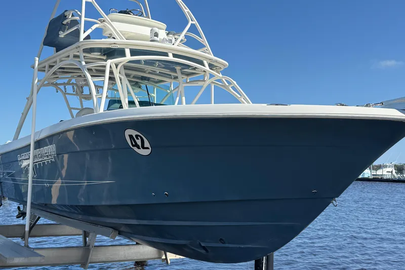 The Image of 2012 Hydra-Sports 4200 Siesta boat docked, featuring sleek design and sturdy build. - 0